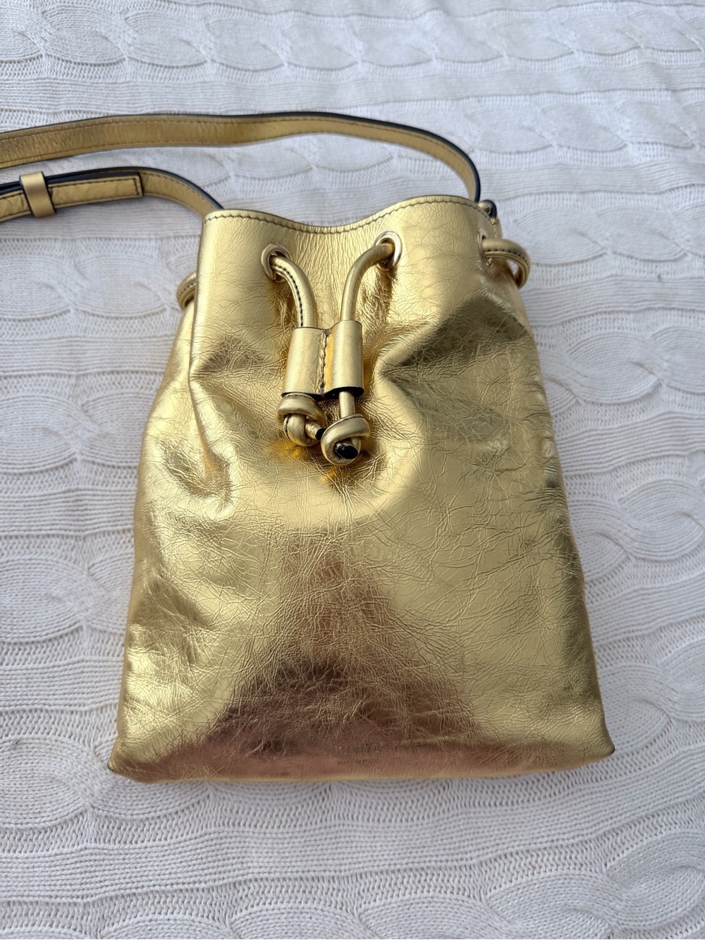 KHAITE Metallic Gold Drawstring Mini Crossbody